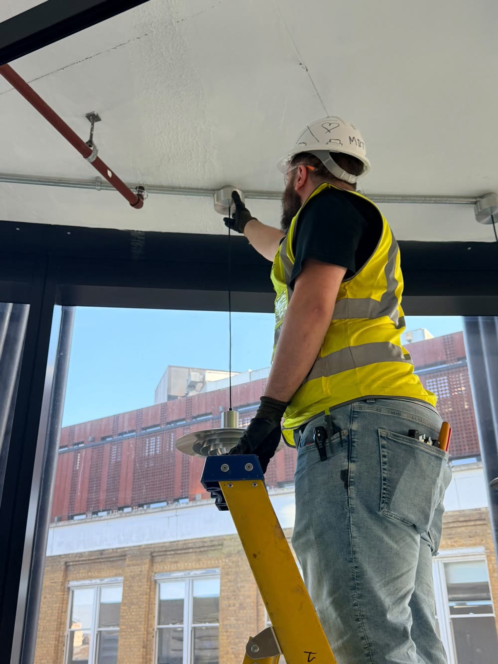 Mehmet fitting pendant lights to galvanised conduit boxes